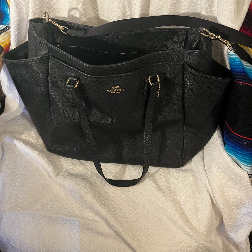 Coach purse it’s really big with lots of pockets